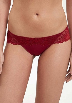 Состав:
Эластичное полотно
ПА 85%
ПУ 15%
Кружево
ПА 90%
ПУ 10%
Ластовица
Хлопок 100%
	Трусики-боксеры выполнены из эластичного полотна и кружева. Передняя деталь декорирована бантиком.