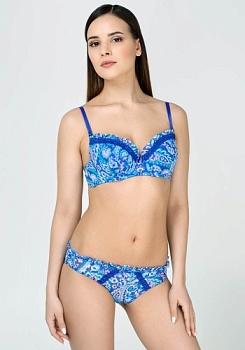 Состав:
Эластичная сетка
ПА 88%
ПУ 12%
Кружево
ПА 90%
ПУ 10%
Ластовица
Хлопок 100%
	Трусики классические выполнены из эластичной принтованной сетки и кружева. Передняя деталь декорирована узким кружевом и бантиком. Линия талии декорирована рю