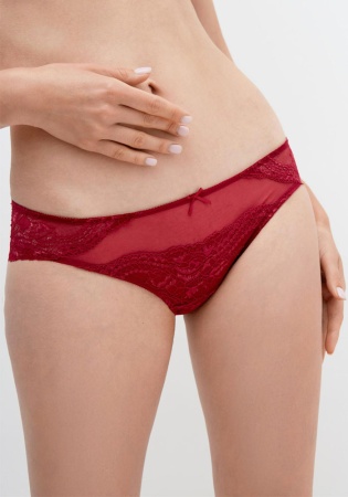 Состав:
Эластичное полотно
ПА 82%
ПУ 18%
Эластичное кружево
ПА 90%
ПУ 10%
Ластовица 
Хлопок 100:
    Женские однотонные трусы-боксеры. Передняя деталь выполнена из эластичного полотна и кружева. Задняя деталь выполнена из эластичного кружева.