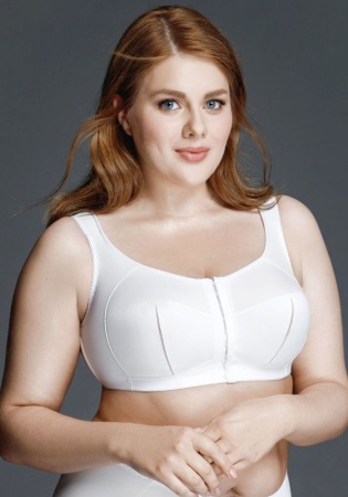 Состав: 
Полиамид 65%
Хлопок 20%
Эластан 15%
       Бюстгальтер из эластичного полотна трикотажного полотна и ламинированного материала, без каркасов. Мягкие чашки с тройным членением. Застёжка спереди. Упругие пластины в боковых деталях стана. Ра