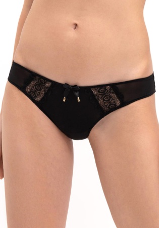 Состав:
Эластичное полотно
ПА 85%
ПУ 15%
Эластичное кружево 
ПА 90%
ПУ 10%
Ластовица
100% хлопок
     Женские трусы-стринги. Детали выполнены из эластичного поллтна и украшены кружевом. Передняя деталь украшена бантиком. Ластовица из 100% хло