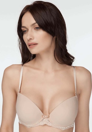 Состав:
Полиамид 55%
Полиэстер 25%
Хлопок 15%
Эластан 5%.
    Бюстгальтер push-up из эластичного трикотажного полотна и эластичного кружева. На каркасах. Жесткие формованные чашки. Съемные бретели. Отделка - атласный бантик.