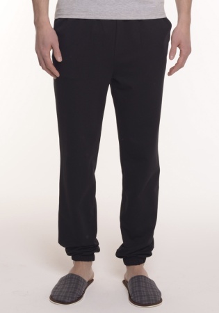 Состав: 
Силаник
Хлопок 75%
ПЭ 20%
Лайкра 5% 
	Мужские брюки. Низ брюк на резинке. Пояс на резинке. Карманы.

Обратите внимание: расцветка товара на сайте может отличаться от фактической расцветки. Оптовый склад оставляет за собой право поста